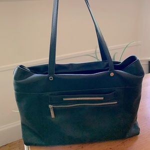 Steve Madden red lined tote with removable laptop sleeve.